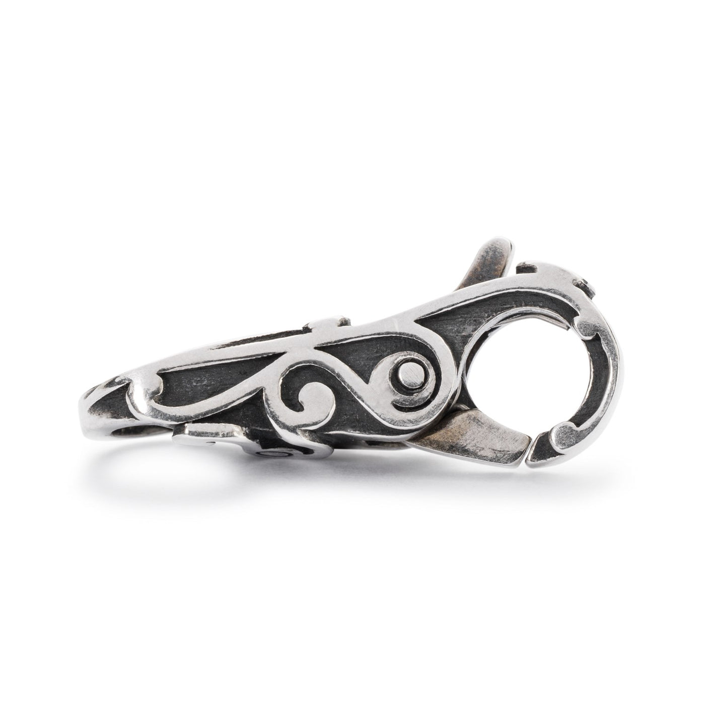 Silver 'Soft Wind of Change' clasp with swirling lines all over, symbolizing transformation and growth.
